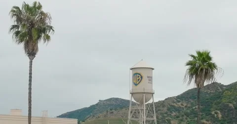 Static shot of Aerial pull-back shot of Warner Brothers WB Water Tower at Studio Stock-Footage 242862507