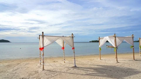 Static shot of beach white gazebos on the beach Stock Footage 111899875
