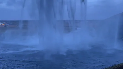 Static Shot Behind Seljalandsfoss Waterfall in Winter, Blue Hour, Iceland. Stock Footage 327673067