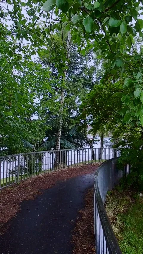 Static shot of bend in pedestrian walkway - Vertical Video Video stock 200401356