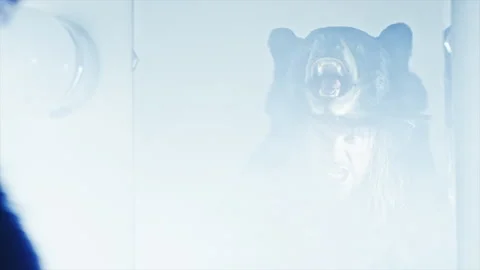 Static shot of Berserker wearing bear coat looking into mirror - Reenactment Stock Footage 202895880