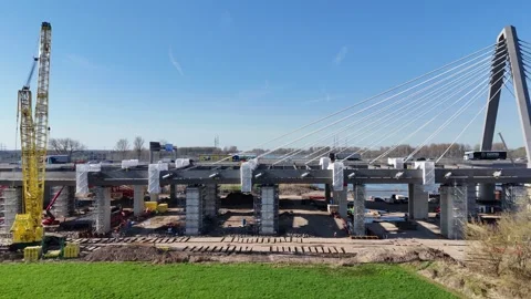 Static shot of bridge construction area with crane Stock Footage 331201080