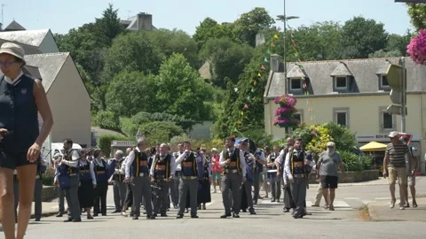 Static shot, bright sunny day, Breton bagpipe band in traditional festival 動画素材 341657745