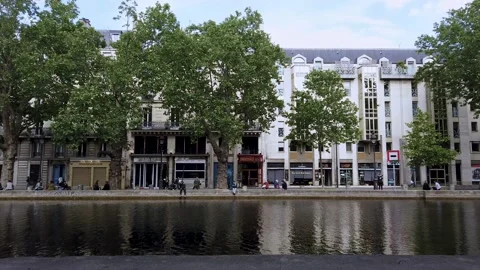Static Shot Of Canal Saint Martin With People Sitting And Enjoying The End Stock Footage 130650907