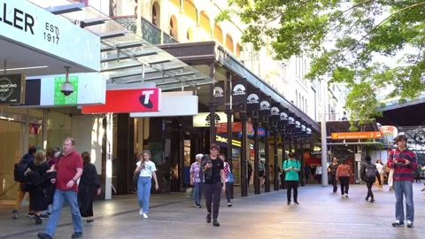 Static shot capturing bustling downtown Brisbane city at Queen street mall Vídeos de archivo 244825429