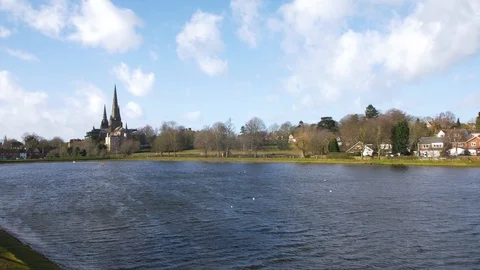 Static Shot of Cathedral in the Distance Overlooking a Lake Stock Footage 85910063