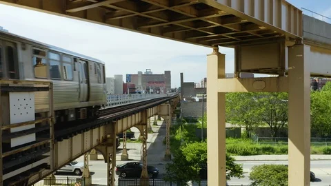 Static Shot as Chicago CTA Subway Train Exits City [4K] Stock Footage 110716707