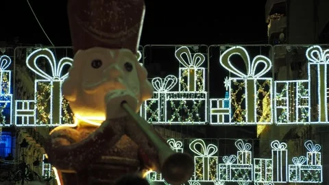 Static shot of a Christmas nutcracker soldier doll decorating an Stock Footage 256289922