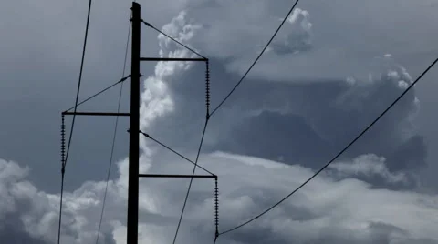 Static shot of clouds rolling behind powerlines Stock Footage 60793846