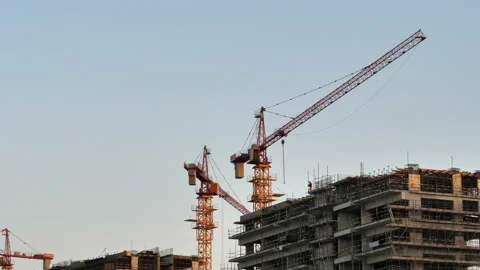 Static shot of cranes working on building construction Stock-Footage 146751359