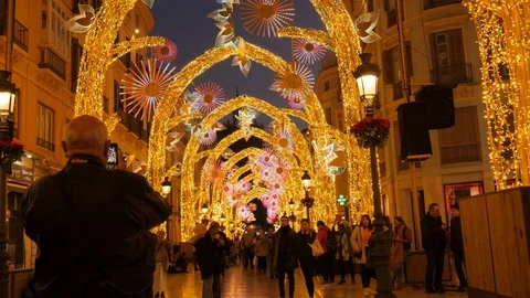 Static shot of a crowd watching night Christmas illumination in the street. Stock Footage 122511186