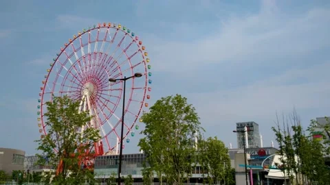 Static shot of Daikanransha Ferris Wheel in Palette Town Odaiba. Stock Footage