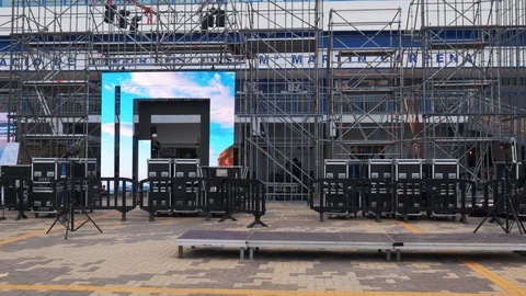 Static shot of details of technical preparation of the stage of an outdoor event Stock Footage 123370477