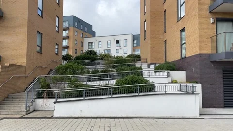 Static Shot of Disabled Access Ramp Between UK Apartment Blocks Video stock 333230156