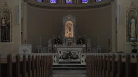 Static Shot Down the Aisle of a Catholic Church Stock Footage 8568753