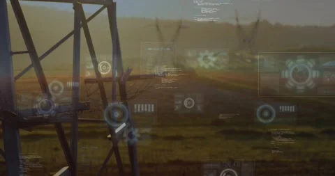 Static shot at dusk digital gauges fading around metal tower, widgets appearing Video stock 328151026