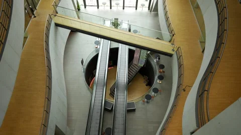 Static shot of escalators in motion, devoid of individuals, at the Royal Stock Footage 253978366
