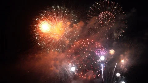 Static shot of fireworks exploding in the dark sky Video stock 114012549