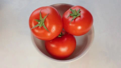 Static Shot of Fresh Tomatoes in a Bowl Stock Footage 246700308