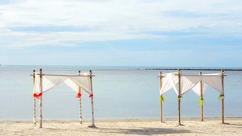 Static shot of gazebos on a clean beach. Stock Footage 113059822