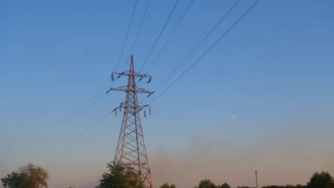 Static shot of a high voltage tower. High voltage tower. High-voltage tower in a Video stock 261221536