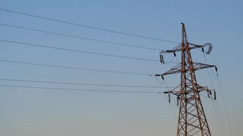 Static shot of a high voltage tower. High voltage tower. High-voltage tower in a Stock-Footage 262770221