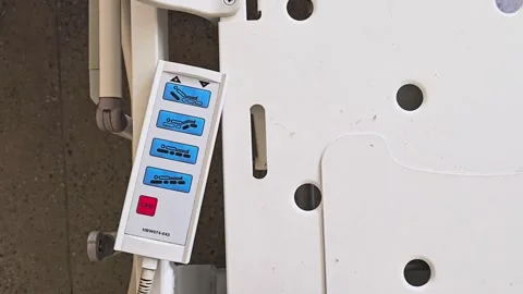 Static shot hospital bed control panel position adjustment in medical room Stock Footage 346622479