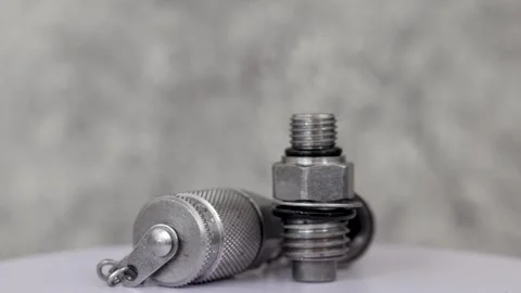 Static shot of hydraulic test point fitting rotating on display. Stock Footage 344798706