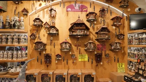 Static shot indoor souvenir cuckoo clocks display in Innsbruck Austria Stock Footage 335961821