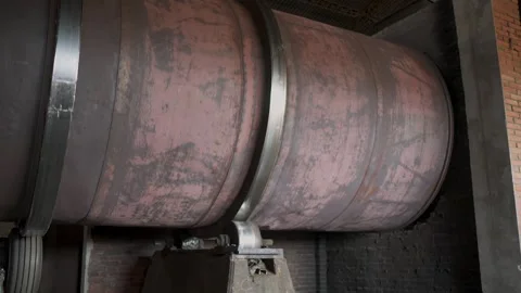 Static Shot of Industrial Drying Drum for Yerba Mate Processing in Large-Scale Stock Footage 318274055