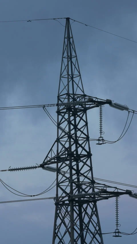 Static Shot of Industrial Electricity Pylon with Moving Clouds under - 4K Video stock 328189745