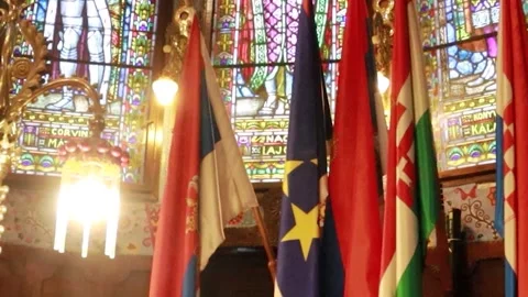 Static Shot of International Flags Mounted in Historic Synagogue Stock Footage 330369801