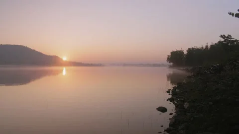 Static shot of a lake during a beautiful sunrise Video stock 140126474