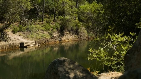 Static shot of lake in the middle of forest in Sintra Stock Footage 112718982