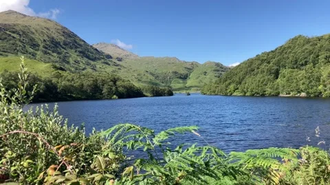 Static shot of lake mountains and waves moving 動画素材 282954283