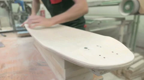 Static shot of man making the longboard Stock Footage 58306829