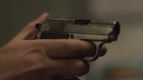 Static shot of man pointing a handgun Stock Footage 244645255