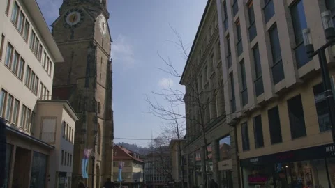 Static Shot of Man Walking Towards Evangelische Schlosskirche-Schlossplatz Stock Footage 235260223