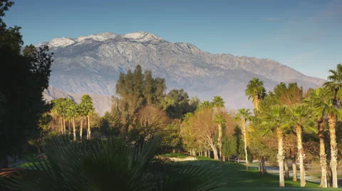 Static Shot of a Mountain Overlooking a Golf Course Hole Stock Footage 66515833