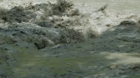Static shot of murky water in river rapids Stock Footage 153811573