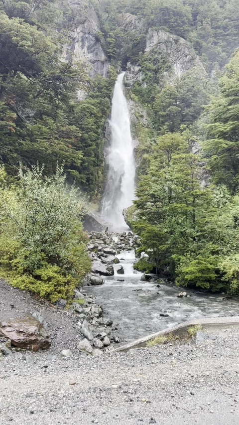 Static Shot of Otter Waterfall Amid Lush Greenery in Southern Chile Video stock 310502425
