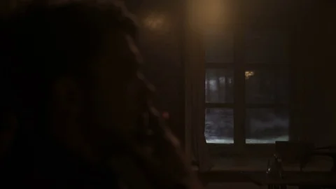 Static shot of the out of focus man smoking a cigarette and hallucinations Stock Footage 81987604