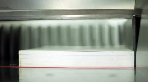 A static shot of a paper cutting machine at a printing press Stock Footage 59842960