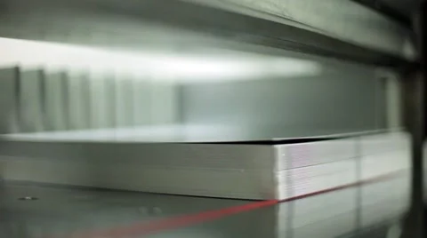 A static shot of a paper cutting machine at a printing press Stock Footage 59842976