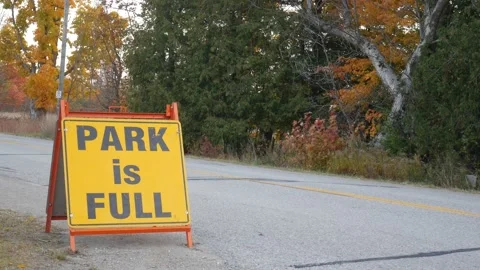 Static shot of park is full sign on the road Stock Footage 220751468