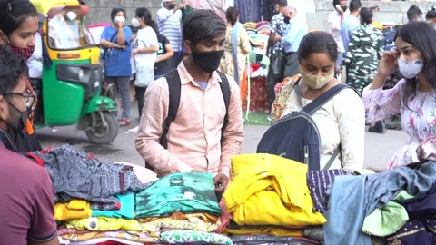 Static shot of people buying clothes from Janpath at New Delhi, India Stock Footage 166345101