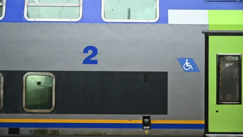 Static shot of people moving inside a train Stock Footage 162685350