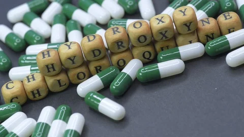 Static shot of pills move for Hydroxychloroquine tablets for Covid-19 cure. Stock Footage 127490196
