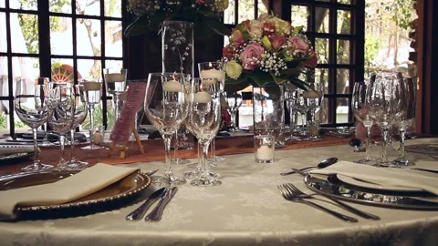 Static shot of place settings with candles and flowers Stock Footage 160829670