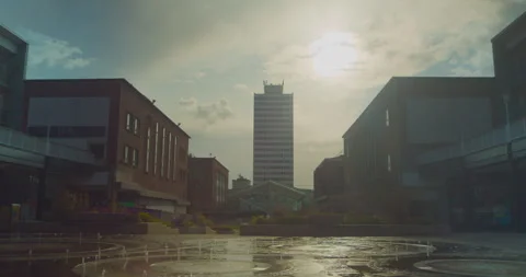 Static shot of a quiet city centre during sunset. Video stock 246473053